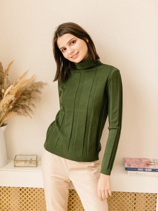 studio-portrait-of-a-young-woman-in-sweater-on-beige-background-.jpg