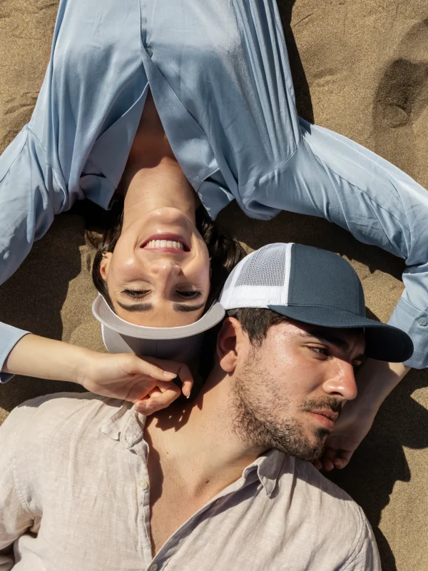 | top-view-couple-wearing-trucker-hats